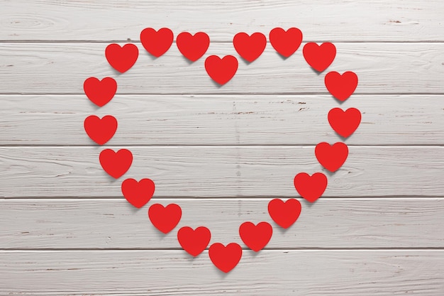 Coeurs en papier rouge en forme de grand coeur sur fond de planche de bois rendu 3d
