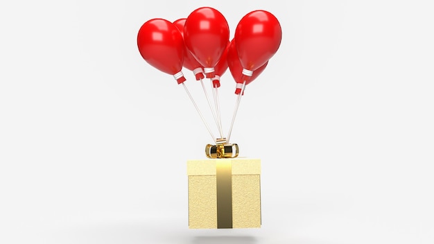 Le coffret cadeau or et ballon rouge sur fond blanc rendu 3d