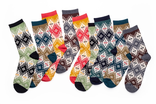 Collection de chaussettes tricotées multicolores avec ornement festif lumineux