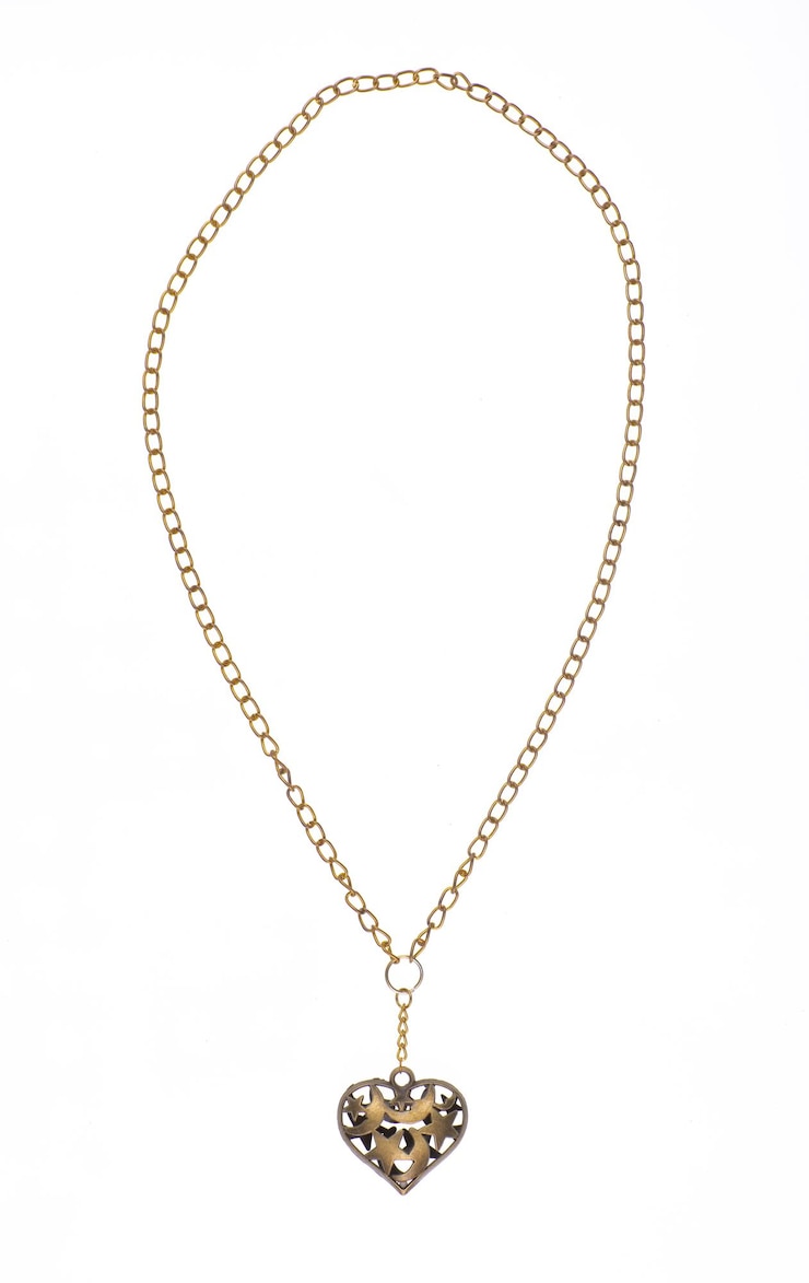 Photo un collier avec une chaîne d'or qui dit libre
