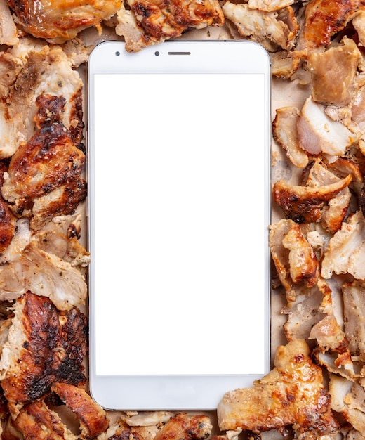 Commande en ligne de gyros Shawarma Nourriture de viande grecque traditionnelle turque et un téléphone mobile