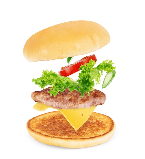 Composants de Burger en vol sur fond blanc