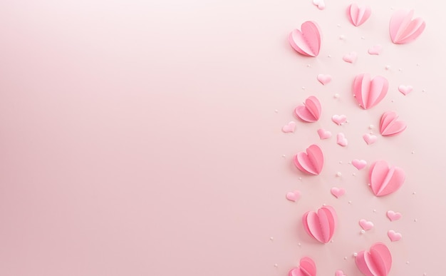 Concept de l'amour et de la Saint-Valentin à base de coeurs en papier rose sur fond pastel