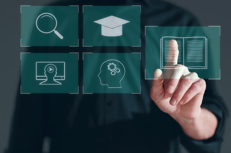 Photo concept d'apprentissage électronique et d'éducation en ligne l'élève apprend une leçon en ligne et pointe un doigt vers l'écran de l'appareil livre d'icônes