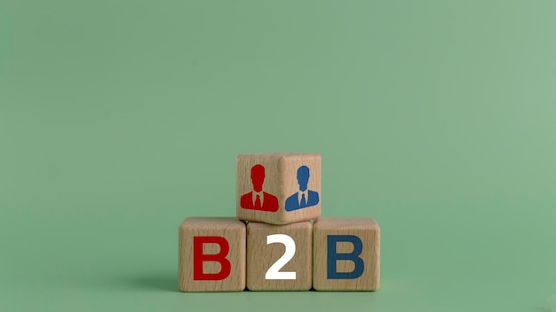 Concept de B2B avec des icônes sur des cubes en bois