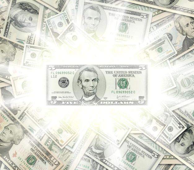 Le concept de billets de banque en dollars lumineux