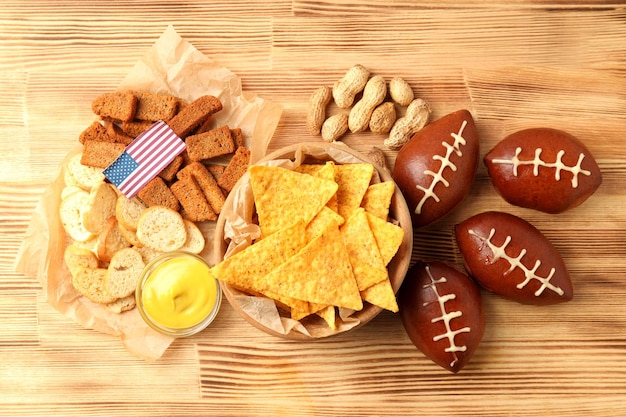 Concept de collations Super Bowl sur fond de bois