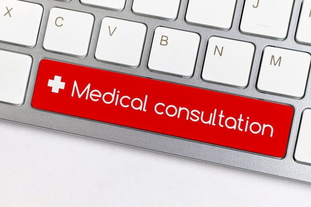 Concept de consultation médicale en ligne sur le bouton du clavier