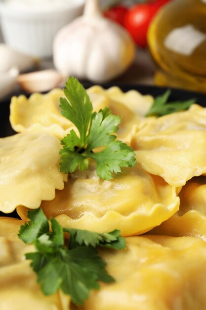 Concept de cuisine délicieuse avec des raviolis close upx