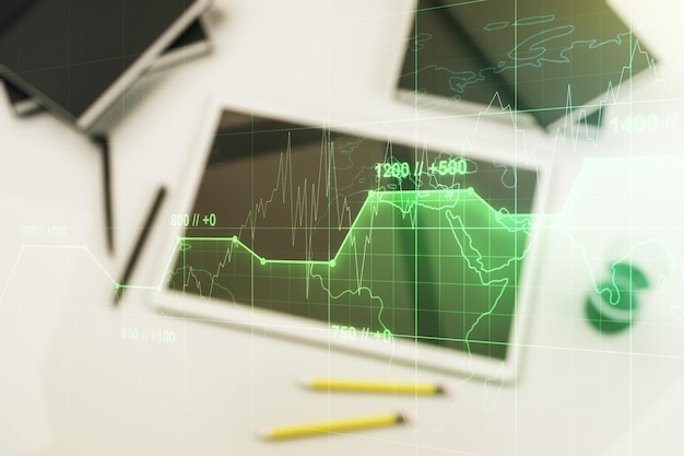 Concept de données de statistiques créatives abstraites et tablette numérique moderne en arrière-plan vue supérieure multiexposition