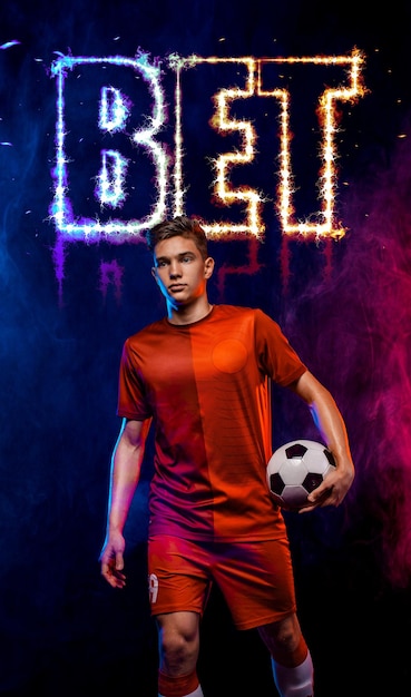 Concept de football paris sportifs sur le football Conception pour un bookmaker Télécharger une bannière verticale pour le site de sport Joueur de football sur un fond de feu