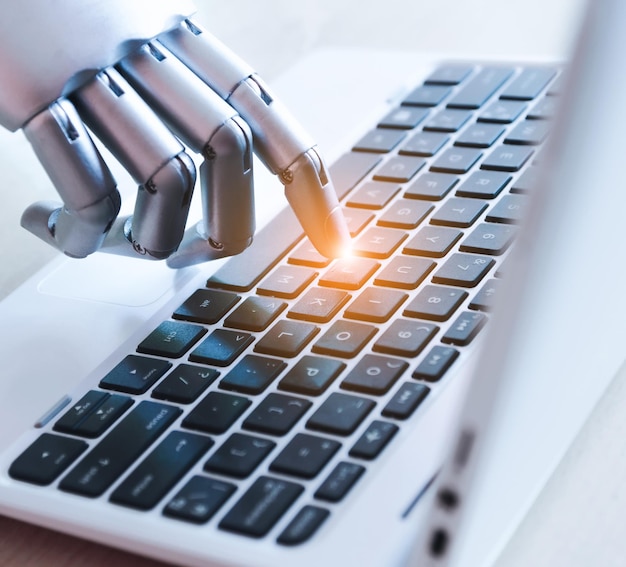 Concept d'intelligence artificielle robot main clés ordinateur