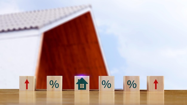 Concept d'investissement immobilier Gestion d'actifs Taux d'intérêt inflation Prêt hypothécaire augmentation d'impôt Icon de maison à la main sur un cube en bois à partir d'un bloc de pile avec pourcentage et flèche ascendante