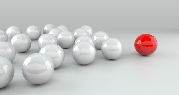 Concept de leadership, boule de leader rouge menant les blancs. Rendu 3D