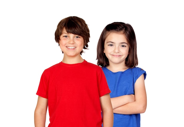 Photo concept de mode et de personnes de l'enfance garçon et fille souriants heureux regardant la caméra