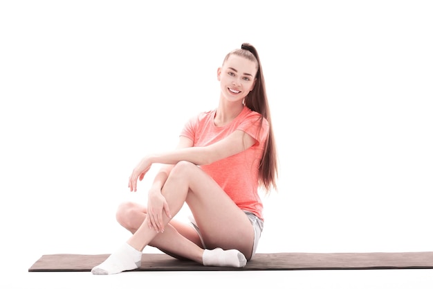 Concept de remise en forme, de sport, de personnes et de mode de vie sain - femme faisant du yoga méditation en lotus pose sur tapis.