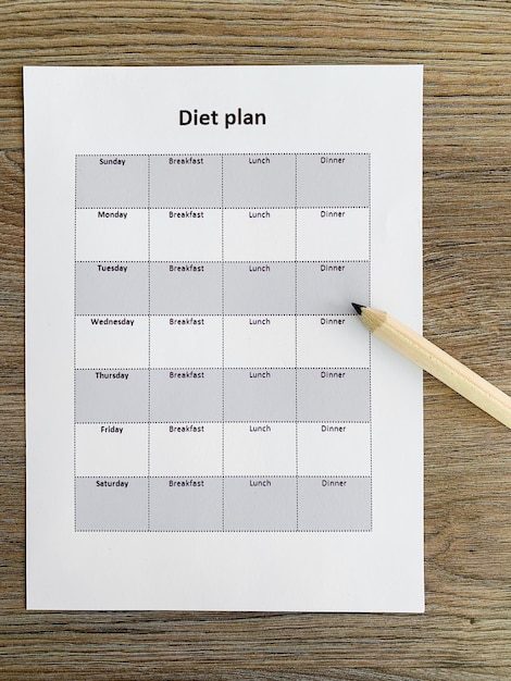 Concept de santé. Plan d'alimentation sur fond en bois.