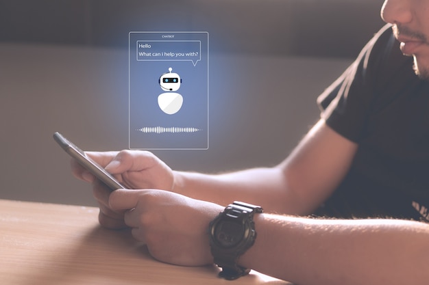 Concept de technologie Chatbot Ai Intelligence artificielle. Mains d'homme tenant un téléphone portable