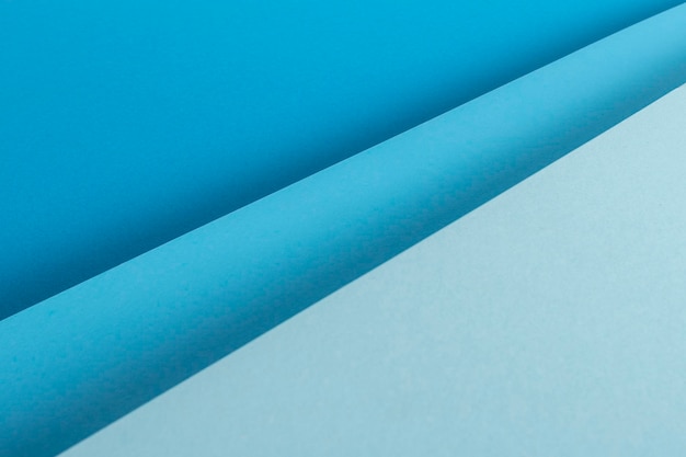 Conception de matériel de papier plié bleu coloré. Vue de dessus, mise à plat.
