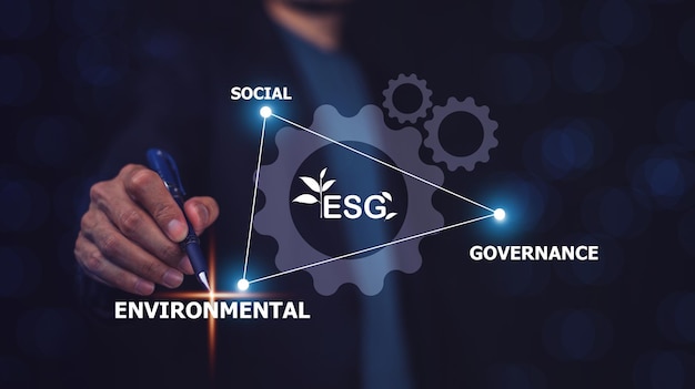 Conception pointant vers la main pour le concept ESG Gouvernance sociale environnementale ESG