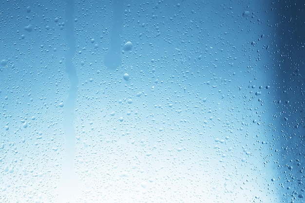 condensat de fond de verre humide / pluie abstraite, gouttes de texture sur verre transparent