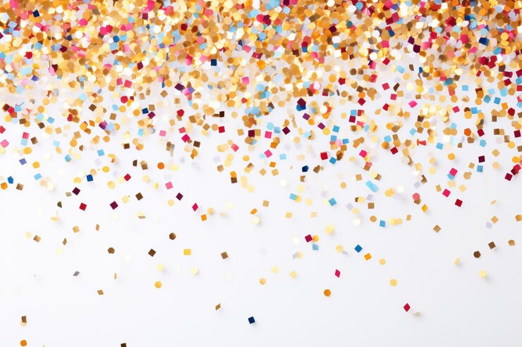 Photo des confettis brillants et colorés sur un fond blanc.