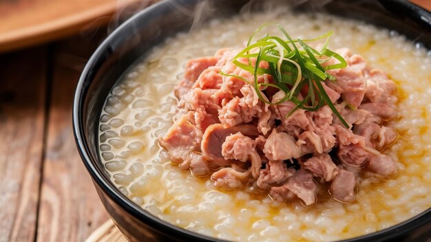 Photo congee avec du porc haché dans un bol