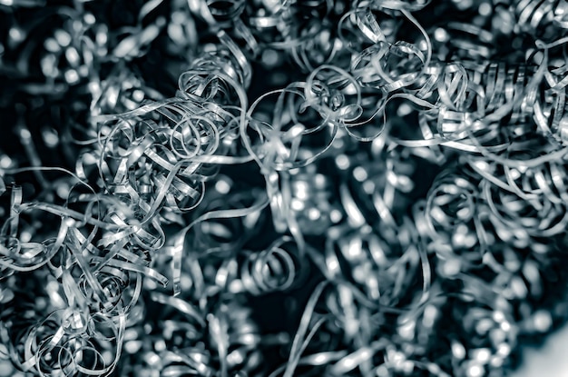 Copeaux de métal de fer boucles fond métal gris Prise de vue macro de l'entreprise de tournage de transformation des métaux