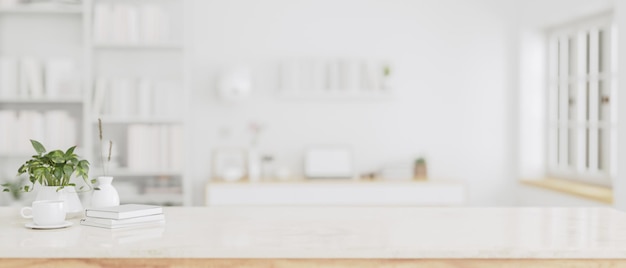 Copiez l'espace sur une table blanche avec une pièce de bureau blanche moderne floue en arrière-plan