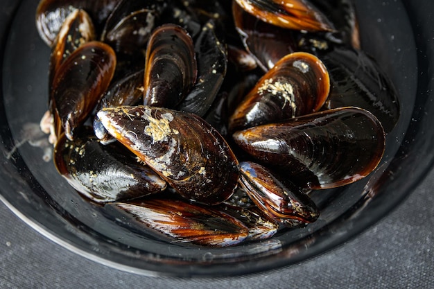 coquille de moule crue repas de fruits de mer collation alimentaire sur la table copie espace arrière-plan alimentaire