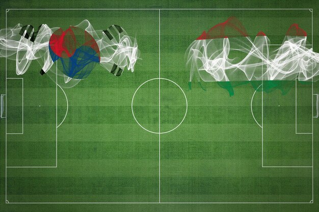 Corée du Sud vs Hongrie Match de football Couleurs nationales Drapeaux nationaux Champ de football Jeu de football Concept de compétition Copier l'espace