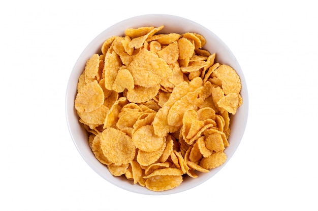 Corn flakes dans un bol isolé