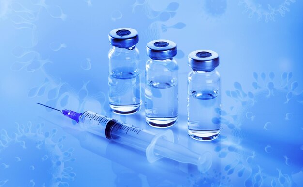 Coronavirus Covid-19 vaccin seringue fond bleu