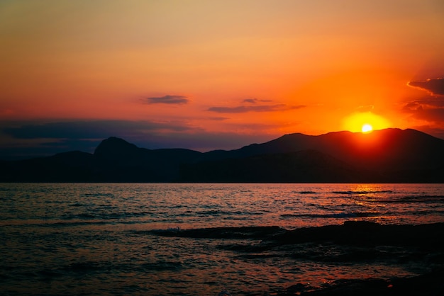 Photo coucher de soleil au bord de la mer