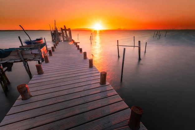 Photo coucher de soleil au port maritime palafitique de carrasqueira