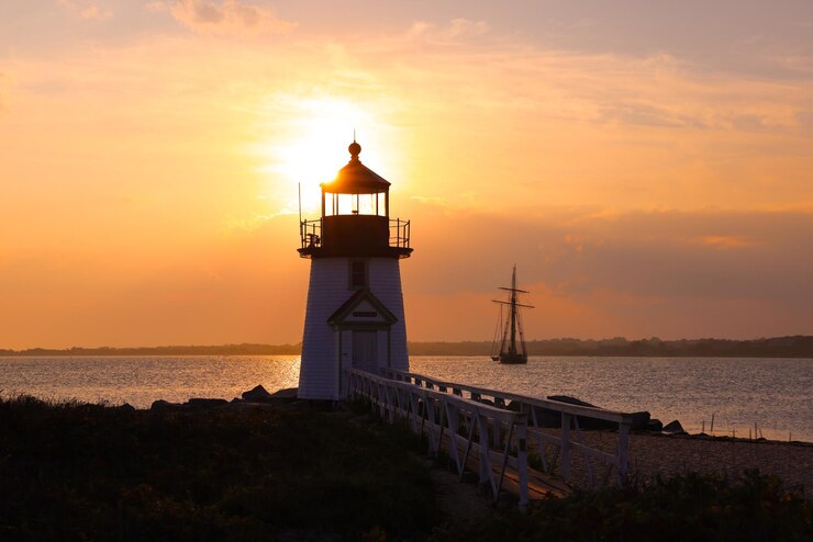 Photo le coucher de soleil du phare