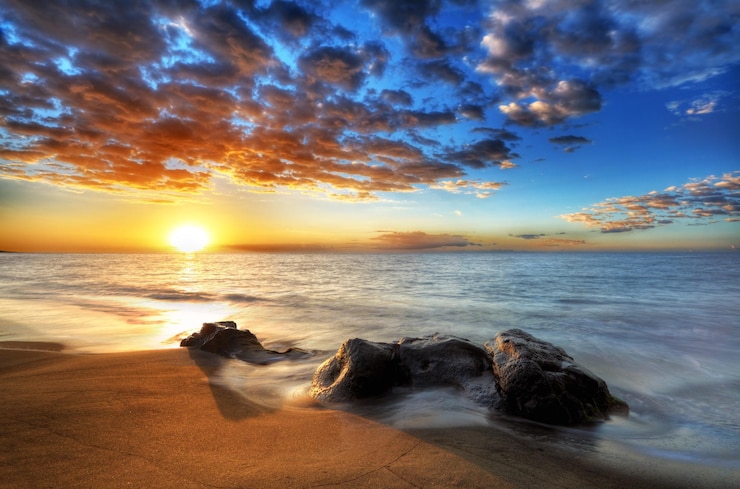 Photo coucher de soleil sur les plages de saint-paul à la réunion