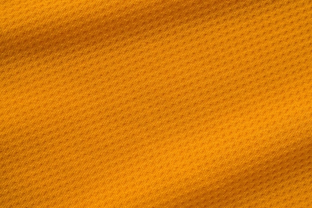 Couleur orange vêtements de sport tissu jersey maillot de football texture vue de dessus