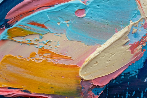 Couleurs complémentaires gros plan de la texture abstraite de peinture d'art colorée rugueuse avec de la peinture au couteau à palette à l'huile sur toile