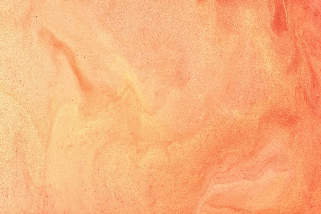 Couleurs de corail abstrait art fluide fond. Marbre liquide. Peinture acrylique sur toile avec dégradé brillant orange. Toile de fond à l'encre d'alcool avec motif ondulé pêche perlé.