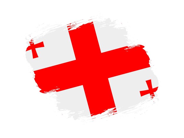 Coup de pinceau drapeau texturé de la géorgie sur fond blanc