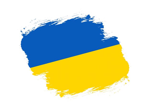 Coup de pinceau drapeau texturé de l'ukraine sur fond blanc