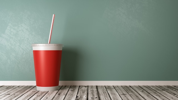 Coupe à boire Fast Food sur plancher en bois contre le mur