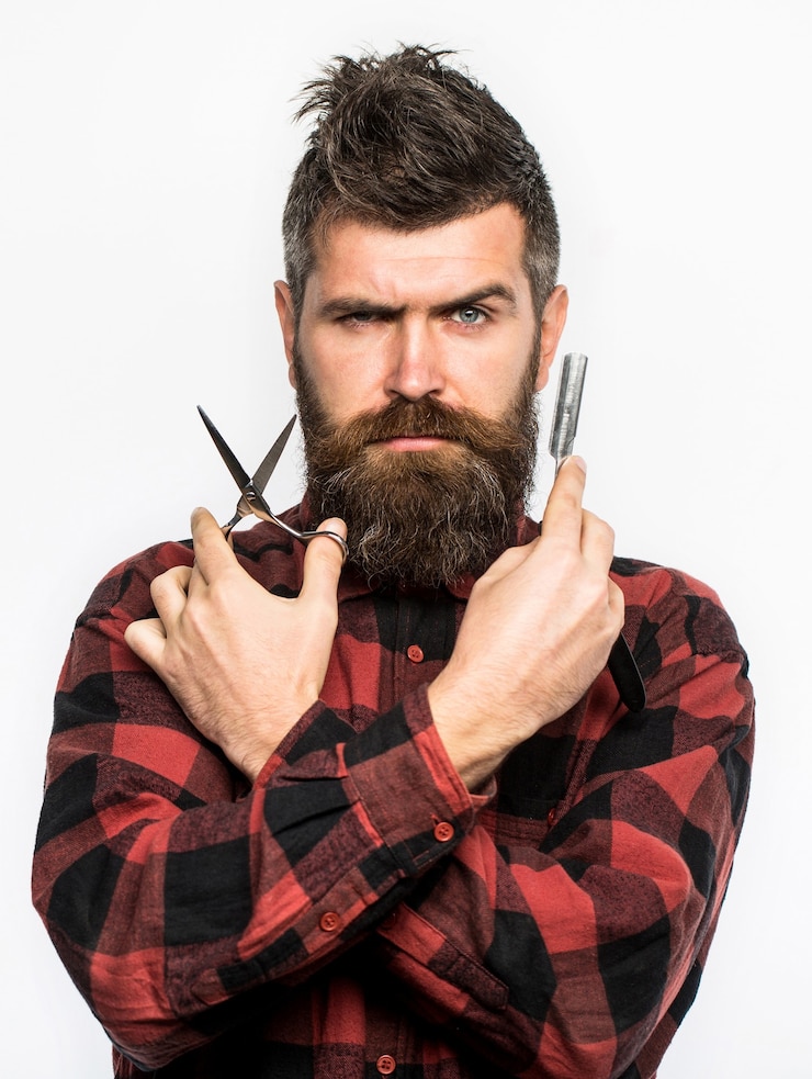 Photo coupe de cheveux homme rasage homme en salon de coiffure