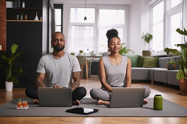 Photo un couple afro-américain prospère dans la pratique du yoga à la maison