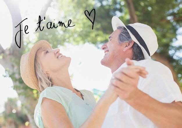 Couple d'âge mûr dansant et texte de la Saint-Valentin