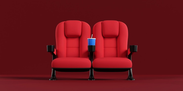 Photo couple de sièges de cinéma debout sur le tapis rouge acheter un concept de billet de cinéma nuit de cinéma rendu 3d