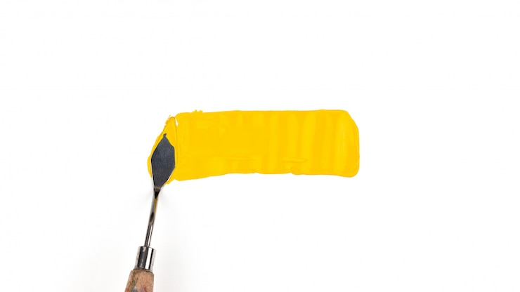 Photo un couteau à palette de peinture isolé sur un fond blanc