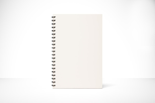 Couverture de bloc-notes vierge sur une maquette de table blanche