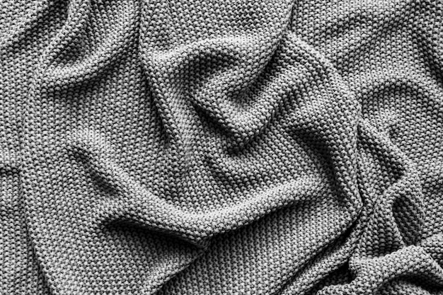 Couverture tricotée couleur gris texture
